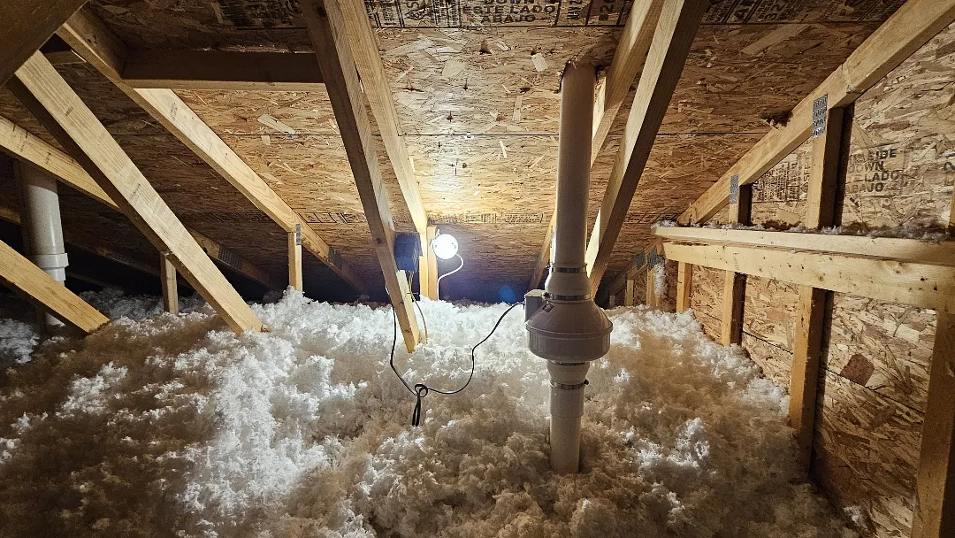 active radon fan on an exterior pipe