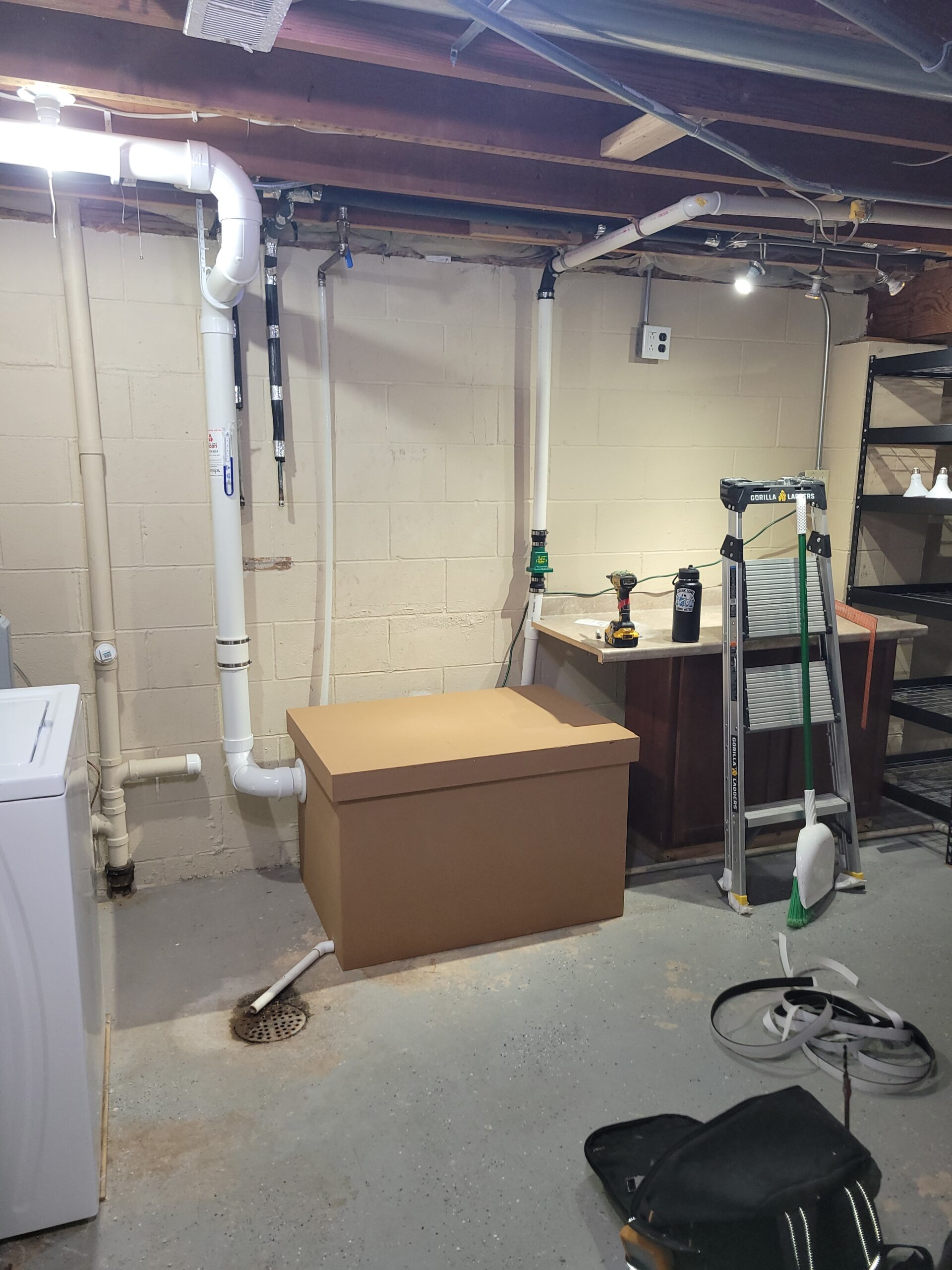 Sealed equipment box for jet sump radon system