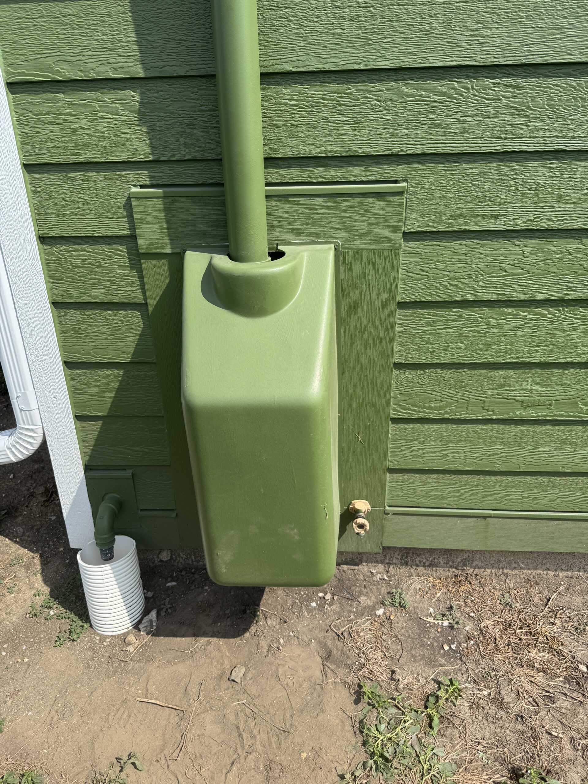 Painted radon mitigation install with fan cover